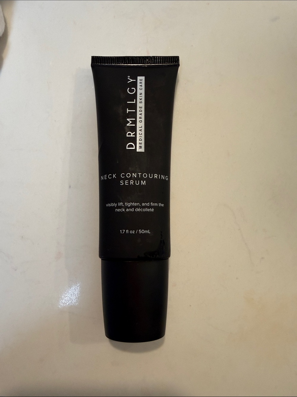DRMTLGY Neck Contouring Serum – Black